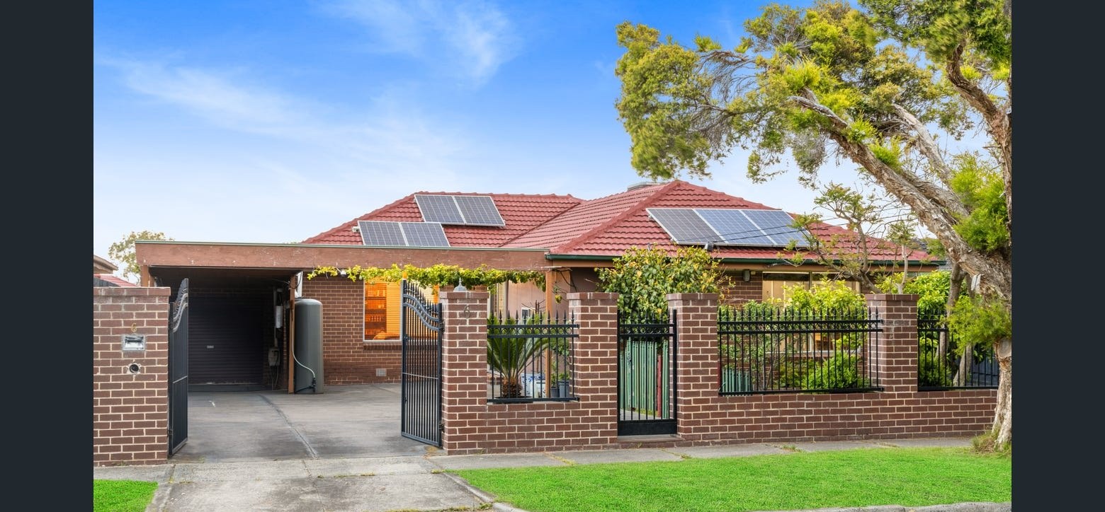 Single-storey Dandenong North home with red tile roof, brick facade and freshly painted trims